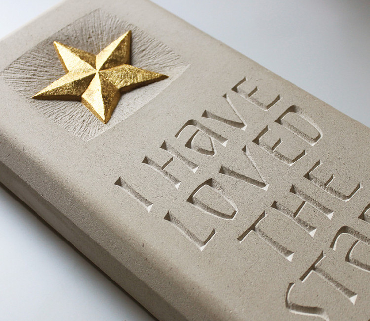 Carved Portland limestone plaque